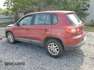 2011 Volkswagen Tiguan S z VIN WVGAV7AX3BW001598, wystawiony jako Copart lot #57518545 z przebiegiem 135 668 mil mil oraz Szkoda całkowita • Salvage title. Historia ofert i sprzedaży dostępna na DreamBid. Obrazek 2.