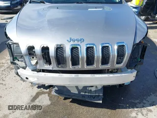 2015 Jeep Cherokee Latitude with VIN 1C4PJLCB8FW620336, listed as a IAAI auction lot 41634997 with 130,335 mi miles. Bid and sale history available at carsss.com. Image 6.