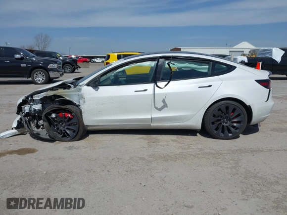 2021 Tesla Model 3 Performance with VIN 5YJ3E1EC8MF044388, listed as a IAAI auction lot 41821892 with Not Provided miles and . Bid and sale history available at carsss.com. Image 13.
