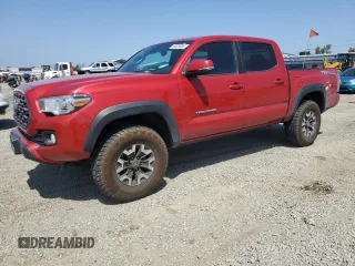 2021 Toyota Tacoma SR z VIN 5TFCZ5AN0MX264665, wystawiony jako Copart lot #56029805 z przebiegiem 88 512 mil mil oraz Szkoda całkowita • Salvage title. Historia ofert i sprzedaży dostępna na DreamBid. Obrazek 1.