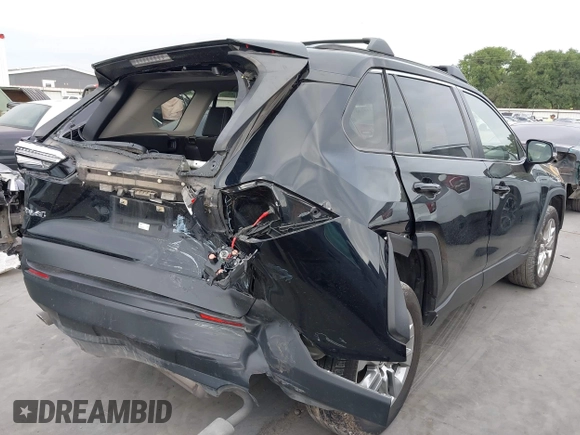 2022 Toyota RAV4 XLE Premium with VIN JTMC1RFV0ND085813, listed as a IAAI auction lot 42152401 with 86,707 mi miles and . Bid and sale history available at DreamBid. Image 4.