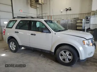 2012 Ford Escape XLS с VIN 1FMCU9C73CKA35456, выставлен на аукционе Copart как лот 54230285 с пробегом 174 263 миль миль и Списание • Salvage title. История ставок и продаж доступна на DreamBid. Изображение 4.