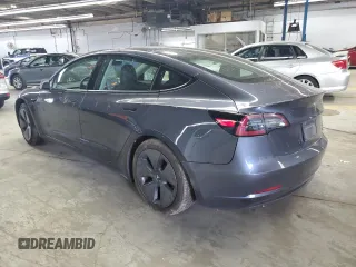 2021 Tesla Model 3 Long Range z VIN 5YJ3E1EB3MF848122, wystawiony jako Copart lot #56423005 z przebiegiem 57 619 mil mil oraz Szkoda całkowita • Salvage title. Historia ofert i sprzedaży dostępna na DreamBid. Obrazek 2.