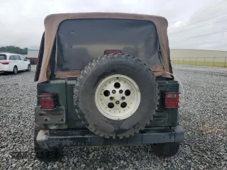 1998 Jeep Wrangler Sport with VIN 1J4FY19S5WP795781, listed as a Copart auction lot 59718065 with 208,416 mi miles and Salvage title. Bid and sale history available at DreamBid. Image 6.
