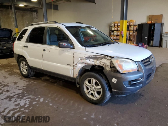 2005 Kia Sportage LX with VIN KNDJE723957069595, listed as a Copart auction lot 80123084 with Not Provided miles and Salvage Title. Bid and sale history available at carsss.com. Image 4.