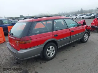 1999 Subaru Legacy Wagon Outback with VIN 4S3BG6852X7649808, listed as a IAAI auction lot 41873182 with 249,996 mi miles. Bid and sale history available at carsss.com. Image 4.