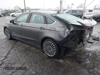 2017 Ford Fusion Titanium with VIN 3FA6P0SU8HR329570, listed as a IAAI auction lot 41773023 with 112,022 mi miles and . Bid and sale history available at DreamBid. Image 3.