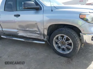 2018 Toyota Tundra 2WD SR with VIN 5TFRM5F16JX133735, listed as a IAAI auction lot 41818455 with 148,456 mi miles. Bid and sale history available at carsss.com. Image 6.