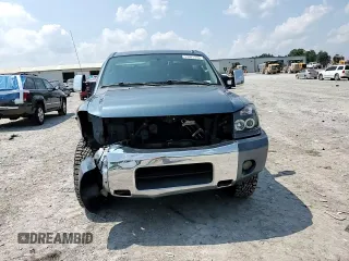 2011 Nissan Titan SL with VIN 1N6AA0EC4BN305296, listed as a Copart auction lot 59001395 with 194,557 mi miles and Salvage title. Bid and sale history available at DreamBid. Image 13.