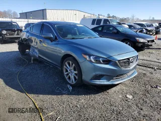 2014 Mazda Mazda6 i Touring with VIN JM1GJ1T55E1110567, listed as a Copart auction lot 83671234 with 143,824 mi miles and Salvage Title. Bid and sale history available at carsss.com. Image 4.