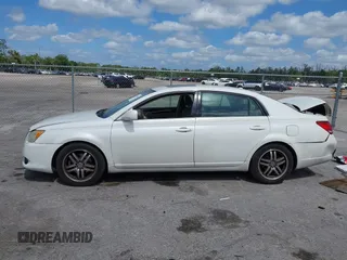 2009 Toyota Avalon XL with VIN 4T1BK36BX9U326841, listed as a IAAI auction lot 42156100 with 166,999 mi miles and . Bid and sale history available at DreamBid. Image 14.
