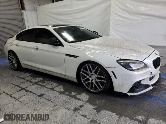 2013 BMW 6 Series 650i with VIN WBA6B2C58DDG66805, listed as a Copart auction lot 44917915 with 135,791 mi miles and Clean Title. Bid and sale history available at DreamBid. Image 4.