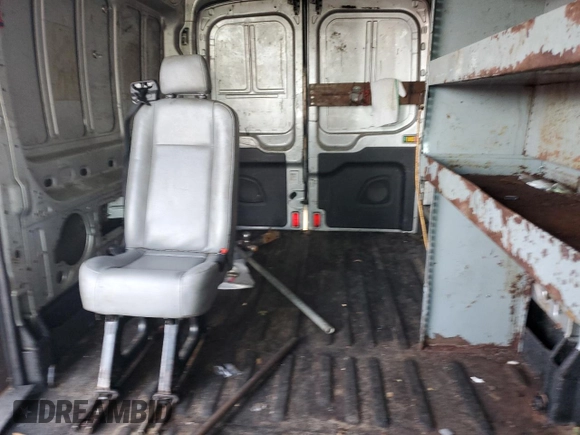 2015 Ford Transit with VIN 1FTNR2CG3FKA61677, listed as a Copart auction lot 87996715 with 178,460 mi miles and Salvage Title. Bid and sale history available at DreamBid. Image 10.