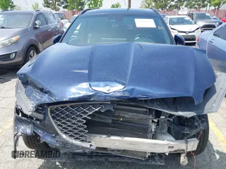2022 Genesis GV70 Sport z VIN KMUMCDTC8NU073409, wystawiony jako IAAI lot #42165056 z przebiegiem 78 392 mil mil oraz . Historia ofert i sprzedaży dostępna na DreamBid. Obrazek 6.