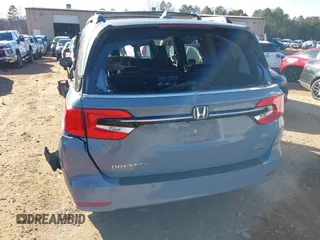 2023 Honda Odyssey Touring with VIN 5FNRL6H84PB005208, listed as a IAAI auction lot 41374452 with 60,288 mi miles and . Bid and sale history available at DreamBid. Image 19.