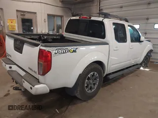 2014 Nissan Frontier SV with VIN 1N6AD0EV4EN736220, listed as a IAAI auction lot 41241823 with 91,789 mi miles and . Bid and sale history available at DreamBid. Image 4.