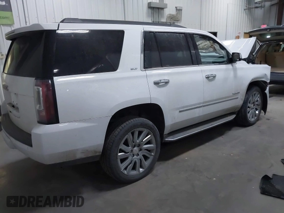 2020 GMC Yukon SLT with VIN 1GKS2BKC2LR175800, listed as a IAAI auction lot 41225753 with 80,333 mi miles. Bid and sale history available at carsss.com. Image 4.