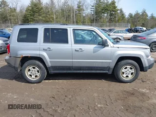 2014 Jeep Patriot Sport z VIN 1C4NJRBB5ED815798, wystawiony jako IAAI lot #41795546 z przebiegiem 106 875 mil mil oraz . Historia ofert i sprzedaży dostępna na DreamBid. Obrazek 13.