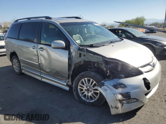 2010 Toyota Sienna XLE with VIN 5TDYK4CC3AS324570, listed as a Copart auction lot 60474005 with 259,128 mi miles and Salvage title. Bid and sale history available at DreamBid. Image 4.