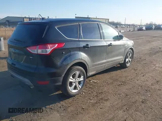 2015 Ford Escape SE with VIN 1FMCU0G79FUA40322, listed as a IAAI auction lot 41791960 with 124,543 mi miles. Bid and sale history available at carsss.com. Image 4.