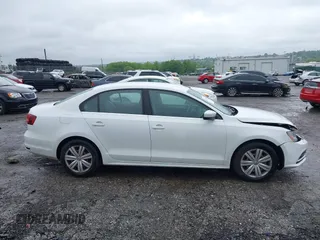 2017 Volkswagen Jetta S with VIN 3VW2B7AJ4HM400684, listed as a IAAI auction lot 42371463 with 119,799 mi miles and . Bid and sale history available at DreamBid. Image 13.