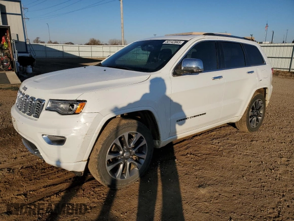 2017 Jeep Grand Cherokee Overland with VIN 1C4RJFCG3HC675125, listed as a Copart auction lot 50142865 with 113,819 mi miles and Salvage Title. Bid and sale history available at carsss.com. Image 1.