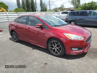 2015 Ford Focus SE z VIN 1FADP3F24FL332883, wystawiony jako Copart lot #64429655 z przebiegiem 65 939 mil mil oraz Szkoda całkowita • Salvage title. Historia ofert i sprzedaży dostępna na DreamBid. Obrazek 4.