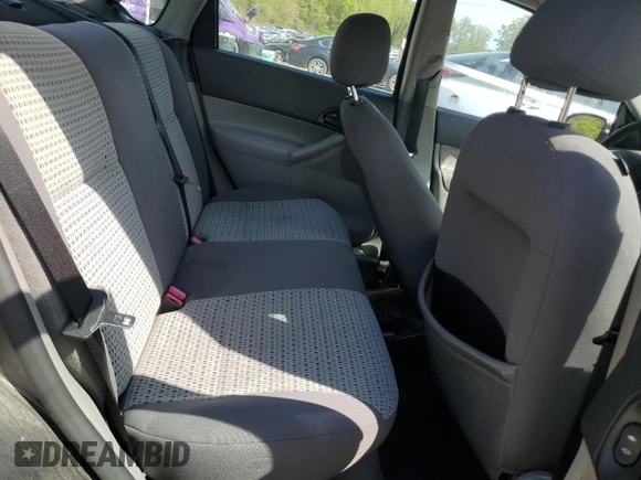 2007 Ford Focus S z VIN 1FAHP34N57W145697, wystawiony jako Copart lot #55335235 z przebiegiem 228 416 mil mil oraz Nie do naprawy • Non repairable. Historia ofert i sprzedaży dostępna na DreamBid. Obrazek 10.