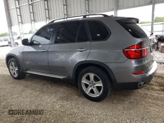 2012 BMW X5 35d with VIN 5UXZW0C53CL671564, listed as a Copart auction lot 60880715 with 154,401 mi miles and Clean title. Bid and sale history available at DreamBid. Image 2.