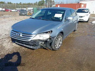 2012 Toyota Avalon z VIN 4T1BK3DB5CU456391, wystawiony jako IAAI lot #41388405 z przebiegiem 107 280 mil mil oraz . Historia ofert i sprzedaży dostępna na DreamBid. Obrazek 18.