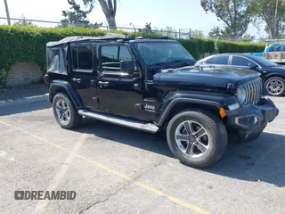 2018 Jeep Wrangler Unlimited Sahara with VIN 1C4HJXEN7JW328981, listed as a IAAI auction lot 42217508 with 59,584 mi miles and . Bid and sale history available at DreamBid. Image 1.
