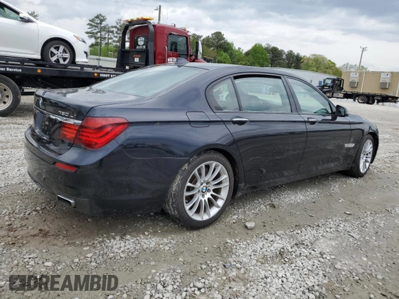 2015 BMW 7 Series 750Li with VIN WBAYE8C50FD781398, listed as a Copart auction lot 49519484 with 54,075 mi miles and Salvage Title. Bid and sale history available at carsss.com. Image 3.