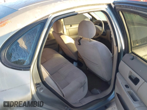2003 Ford Taurus LX Standard with VIN 1FAFP52U33A235063, listed as a IAAI auction lot 41777293 with 164,125 mi miles and . Bid and sale history available at DreamBid. Image 8.