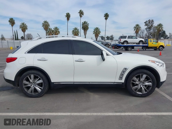 2012 Infiniti FX with VIN JN8AS1MUXCM122268, listed as a IAAI auction lot 41696622 with 158,335 mi miles and . Bid and sale history available at DreamBid. Image 13.