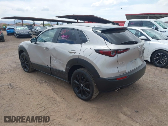 2024 Mazda CX-30 S Select Sport with VIN 3MVDMBBM3RM657918, listed as a IAAI auction lot 42218316 with 27,595 mi miles and . Bid and sale history available at carsss.com. Image 3.