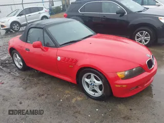 1996 BMW 3-Series Z3 with VIN 4USCH7323TLB69098, listed as a IAAI auction lot 41557656 with 67,858 mi miles. Bid and sale history available at carsss.com. Image 1.