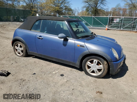 2006 MINI Convertible with VIN WMWRF33556TG14421, listed as a Copart auction lot 50090415 with 136,736 mi miles and Non repairable. Bid and sale history available at DreamBid. Image 4.
