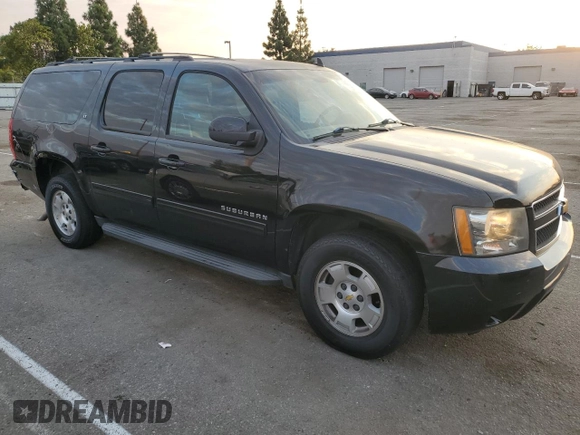 2014 Chevrolet Suburban LT with VIN 1GNSCJE00ER223194, listed as a Copart auction lot 70309624 with 150,009 mi miles and Salvage Title. Bid and sale history available at carsss.com. Image 4.