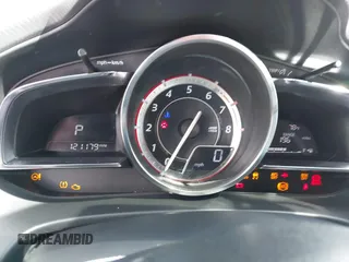 2015 Mazda 3 S Grand Touring with VIN JM1BM1M38F1256560, listed as a IAAI auction lot 41655332 with 121,179 mi miles and . Bid and sale history available at DreamBid. Image 7.