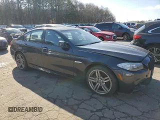 2013 BMW 5 Series 550i xDrive with VIN WBAFU9C52DDY71326, listed as a Copart auction lot 49796115 with 103,411 mi miles and Clean Title. Bid and sale history available at carsss.com. Image 4.