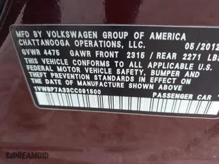 2012 Volkswagen Passat SE w/Sunroof with VIN 1VWBP7A33CC091500, listed as a IAAI auction lot 41815851 with 116,620 mi miles. Bid and sale history available at carsss.com. Image 9.
