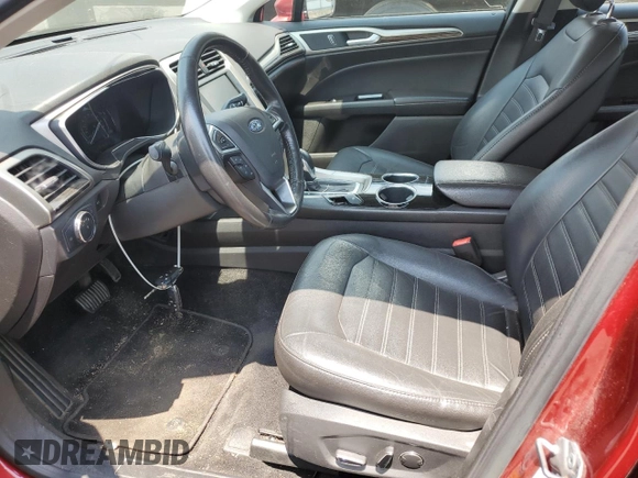 2013 Ford Fusion SE Hybrid z VIN 3FA6P0LUXDR335590, wystawiony jako Copart lot #60541395 z przebiegiem 121 975 mil mil oraz Szkoda całkowita • Salvage title. Historia ofert i sprzedaży dostępna na DreamBid. Obrazek 7.