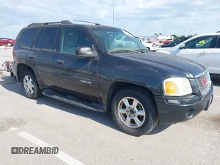 2003 GMC Envoy SLE z VIN 1GKDT13S832272692, wystawiony jako IAAI lot #42289095 z przebiegiem 215 210 mil mil oraz . Historia ofert i sprzedaży dostępna na DreamBid. Obrazek 1.