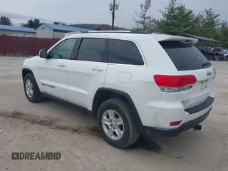 2017 Jeep Grand Cherokee Laredo with VIN 1C4RJFAG2HC605182, listed as a IAAI auction lot 41926247 with 131,474 mi miles. Bid and sale history available at carsss.com. Image 3.