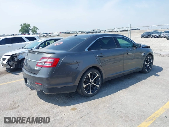 2015 Ford Taurus SEL with VIN 1FAHP2H81FG123199, listed as a IAAI auction lot 42431645 with 183,456 mi miles and . Bid and sale history available at DreamBid. Image 4.