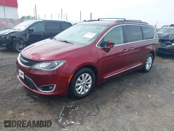 2017 Chrysler Pacifica Touring L z VIN 2C4RC1BG0HR702383, wystawiony jako IAAI lot #42124646 z przebiegiem 141 704 mil mil oraz . Historia ofert i sprzedaży dostępna na DreamBid. Obrazek 19.