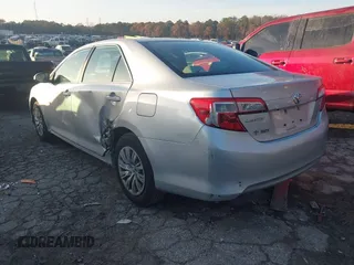 2014 Toyota Camry L with VIN 4T1BF1FK9EU392719, listed as a IAAI auction lot 41090249 with 168,064 mi miles. Bid and sale history available at carsss.com. Image 3.