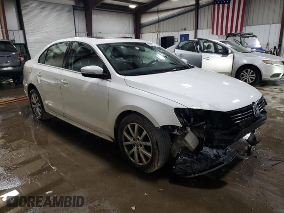 2013 Volkswagen Jetta SE with VIN 3VWDP7AJ9DM355097, listed as a Copart auction lot 62065445 with 196,943 mi miles and Salvage title. Bid and sale history available at DreamBid. Image 4.