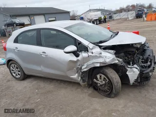 2014 Kia Rio LX with VIN KNADM5A34E6338174, listed as a IAAI auction lot 42039451 with 87,528 mi miles. Bid and sale history available at carsss.com. Image 14.