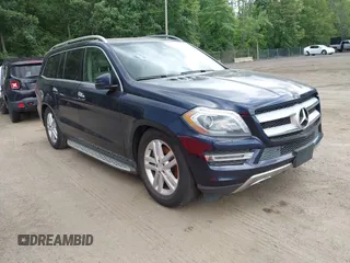 2014 Mercedes-Benz GL 450 z VIN 4JGDF7CE1EA286051, wystawiony jako IAAI lot #42549323 z przebiegiem 143 640 mil mil oraz . Historia ofert i sprzedaży dostępna na DreamBid. Obrazek 1.
